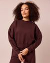 model wears eden black cherry eden jumper