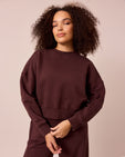 model wears eden black cherry eden jumper