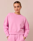 model wears eden washed pink jersey jumper