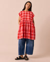 model wears ella pink lemonade cotton linen dress