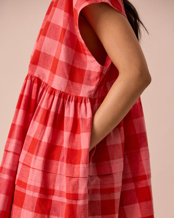 model wears ella pink lemonade cotton linen dress