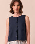 model wears elodie navy linen top