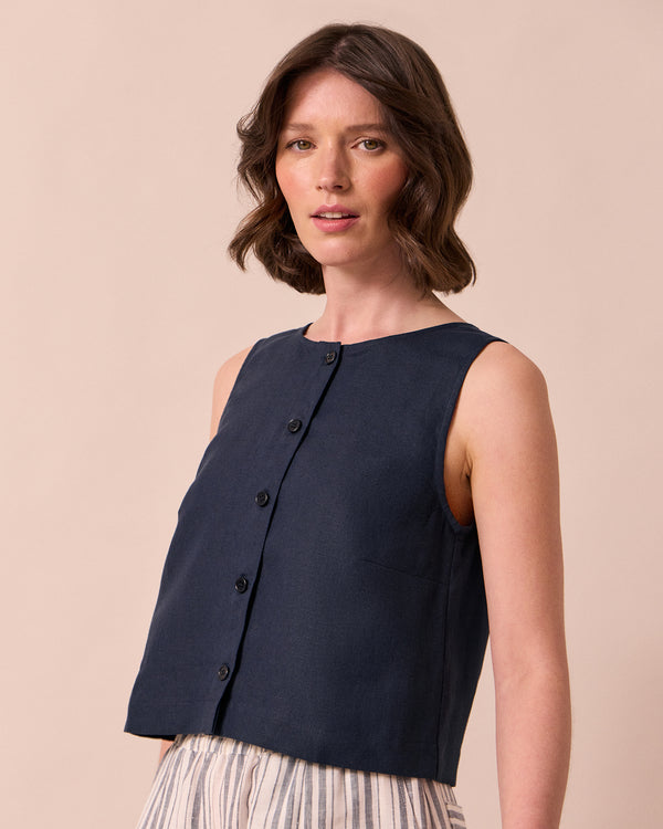 model wears elodie navy linen top