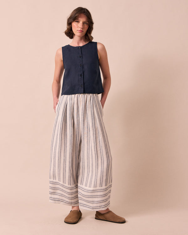 model wears elodie navy linen top