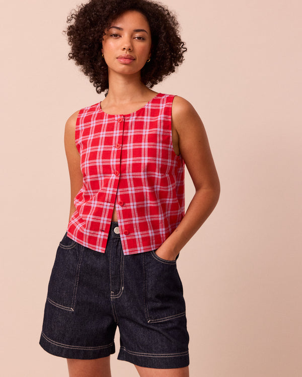 model wears elodie cherry check cotton linen top