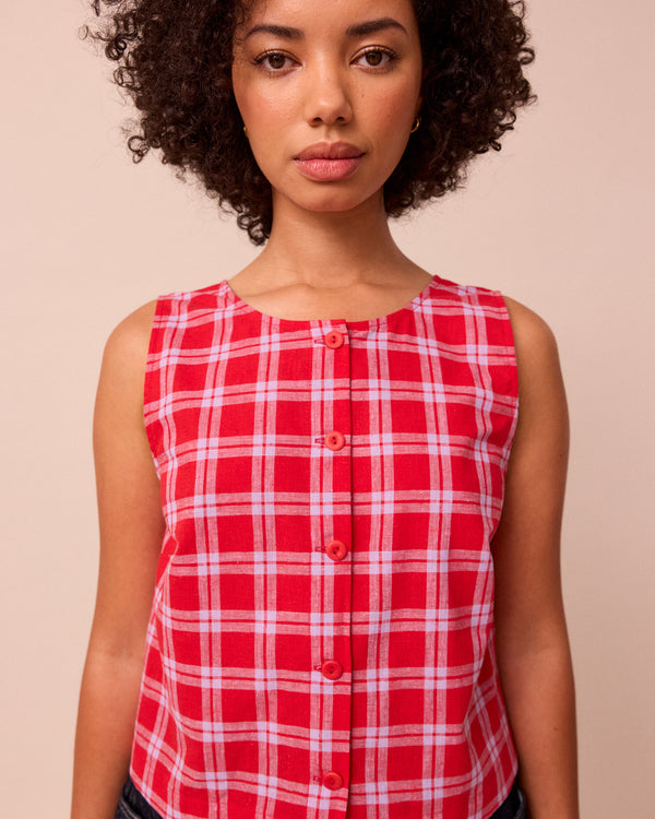 model wears elodie cherry check cotton linen top
