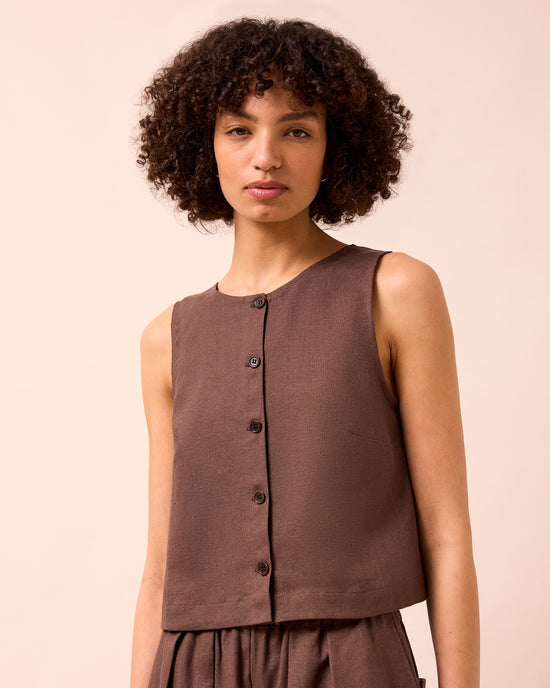 model wears elodie chocolate linen top