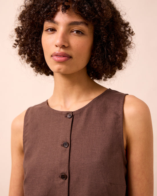 model wears elodie chocolate linen top