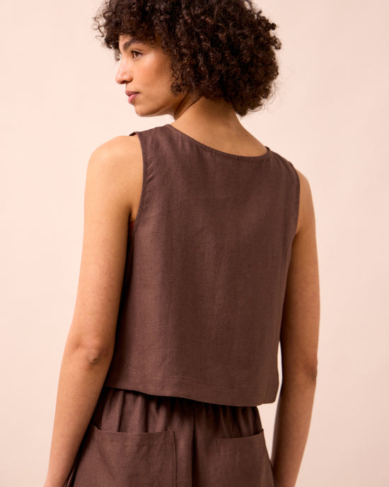 model wears elodie chocolate linen top