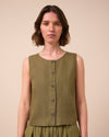 model wears elodie khaki linen top