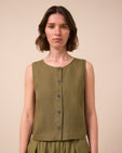model wears elodie khaki linen top