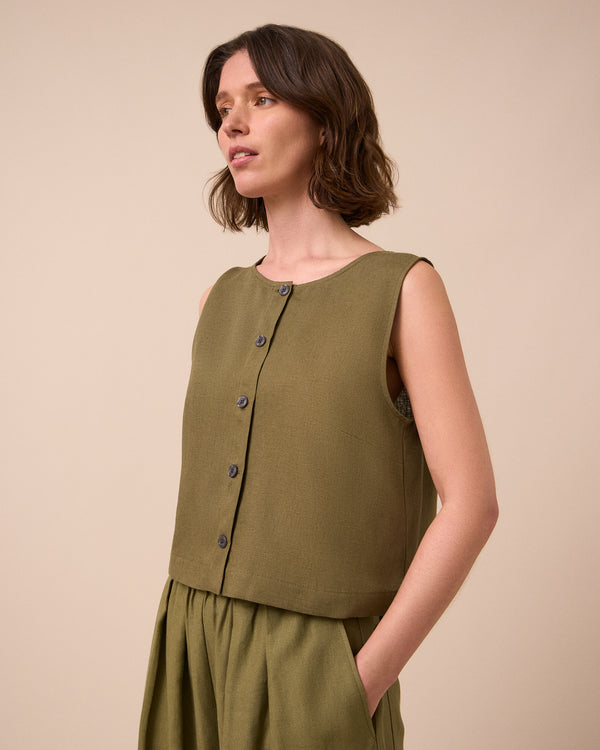 model wears elodie khaki linen top