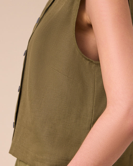 model wears elodie khaki linen top