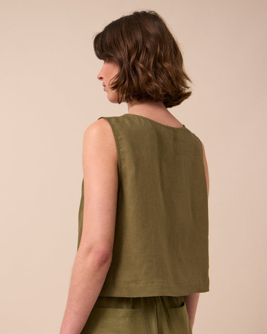 model wears elodie khaki linen top