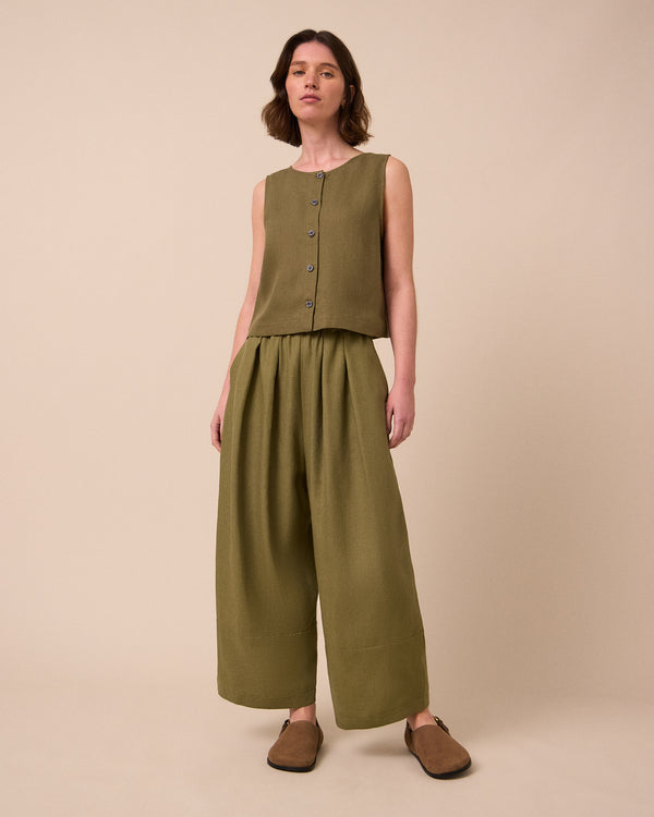 model wears elodie khaki linen top