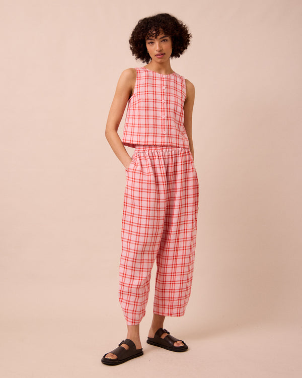 model wears elodie rosa plaid linen top
