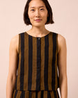 model wears elodie rust stripe linen top
