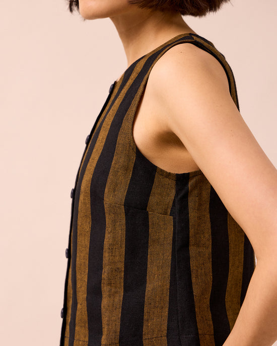 model wears elodie rust stripe linen top