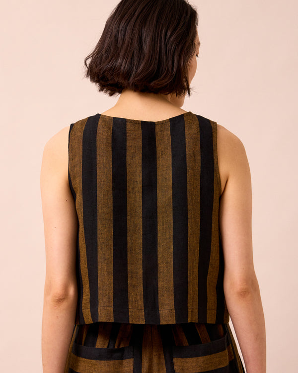 model wears elodie rust stripe linen top