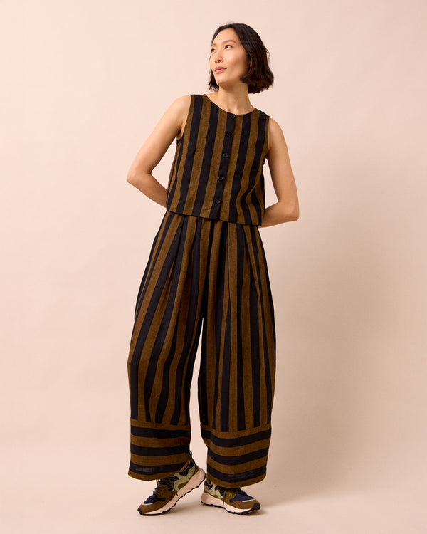 model wears elodie rust stripe linen top
