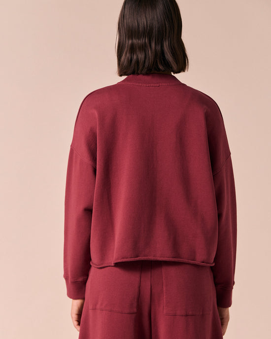 model wears eloise washed berry jersey jumper