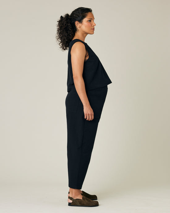 pregnant model wears black seersucker huxley trousers