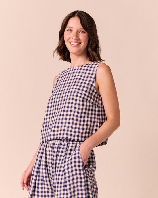model wear esme linen indigo gingham top.
