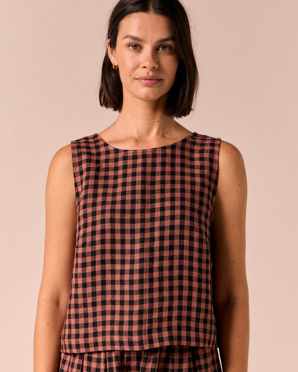 model wears esme dried rose gingham linen top