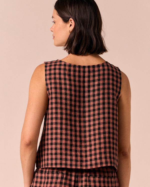 model wears esme dried rose gingham linen top