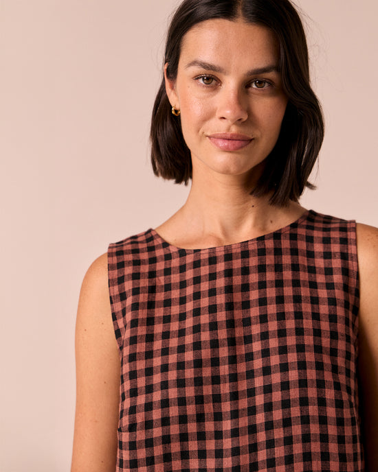 model wears esme dried rose gingham linen top