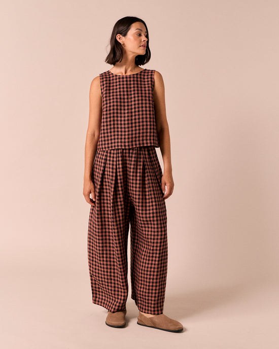 model wears esme dried rose gingham linen top