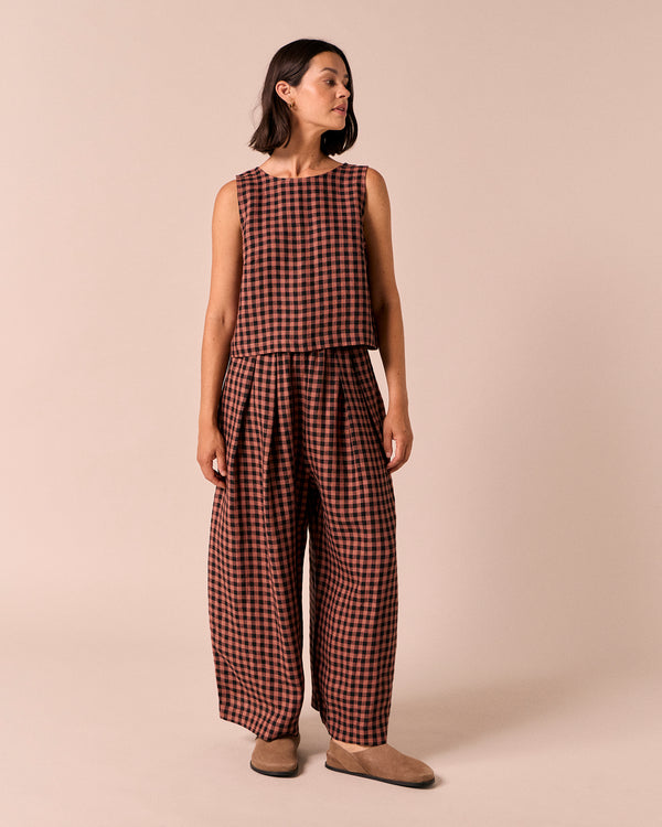 model wears esme dried rose gingham linen top