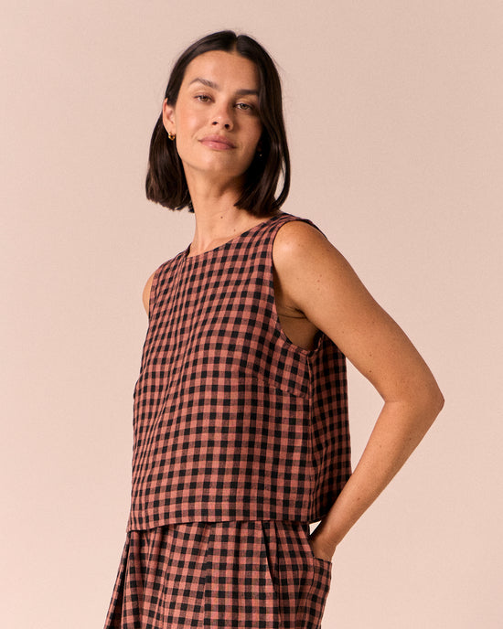 model wears esme dried rose gingham linen top