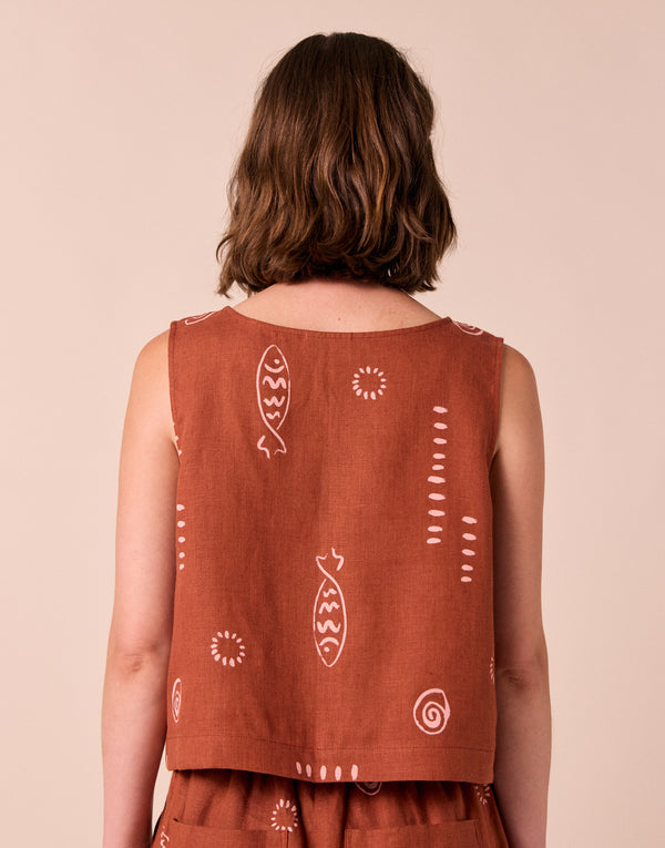 model wears esme beachcomber print linen top.