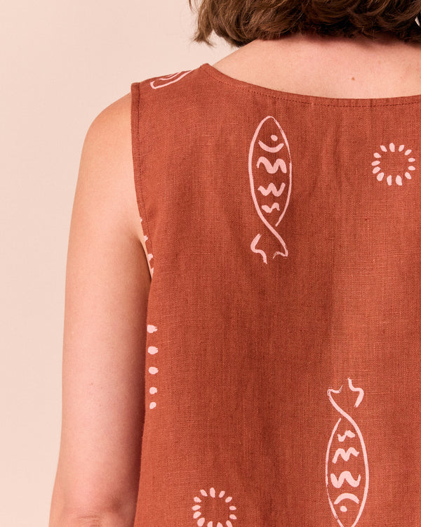 model wears esme beachcomber print linen top.