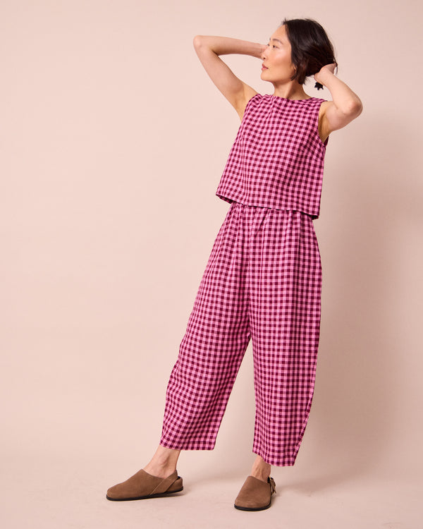 model wears esme summer berry gingham top