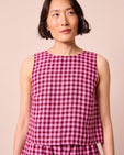 model wears esme summer berry gingham top