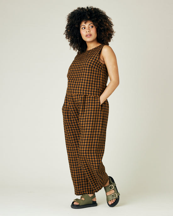 pregnant model wears rust gingham linen esme top