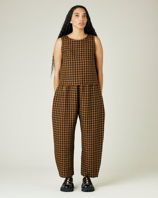 model wears rust gingham linen mabel trousers