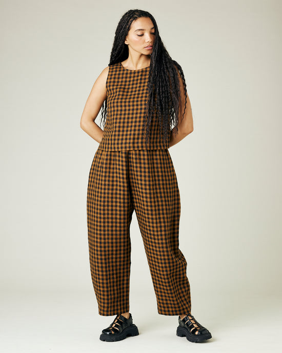 model wears rust gingham linen mabel trousers