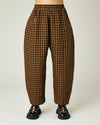 model wears rust gingham linen mabel trousers front