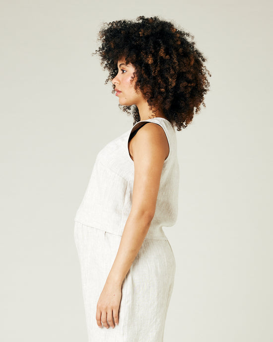 pregnant model wears natural linen esme top