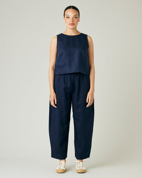 model wears navy linen mabel trousers