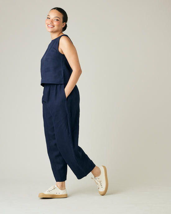 model wears navy linen mabel trousers