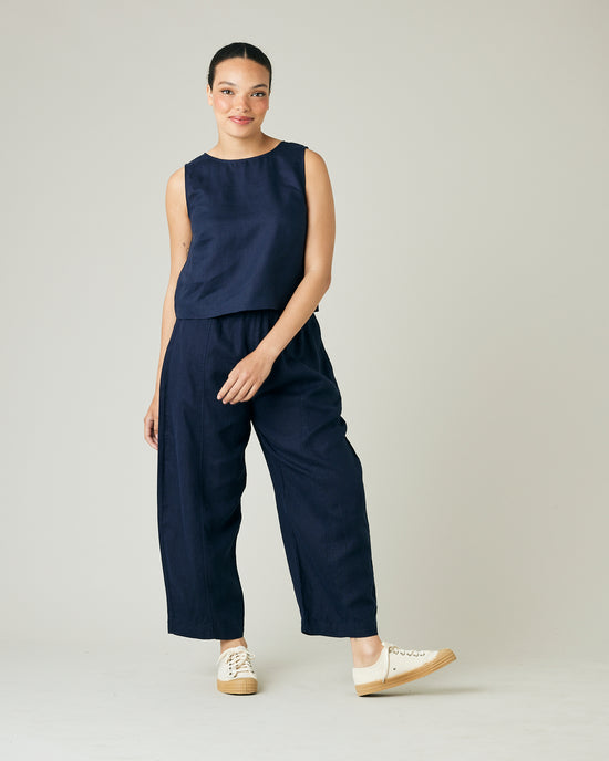 model wears navy linen mabel trousers