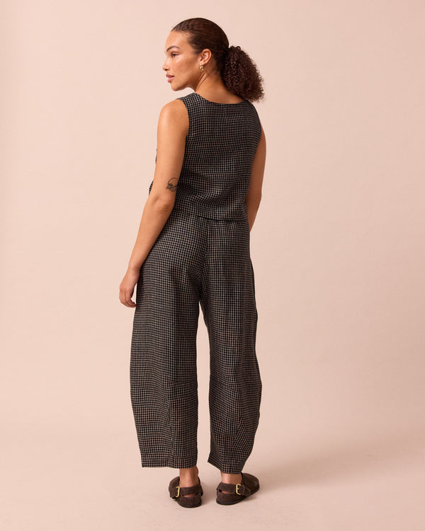 model wears esme black mini grid linen top