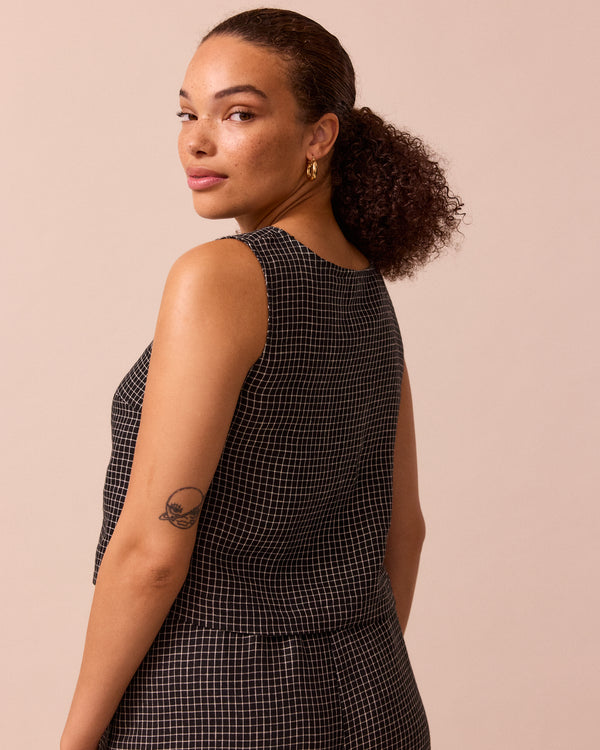 model wears esme black mini grid linen top
