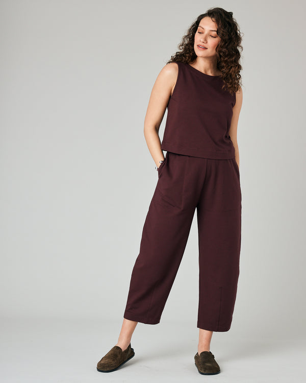 pregnant model wears burgundy huxley jersey trousers