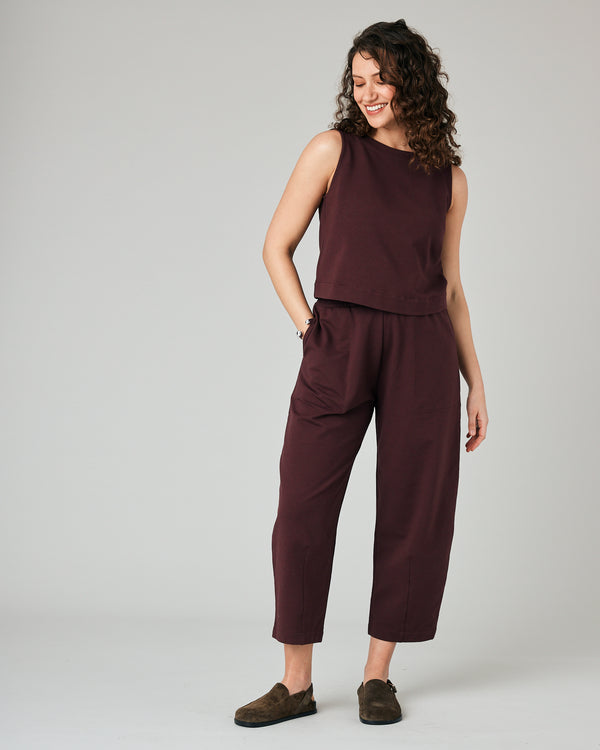 pregnant model wears burgundy huxley jersey trousers