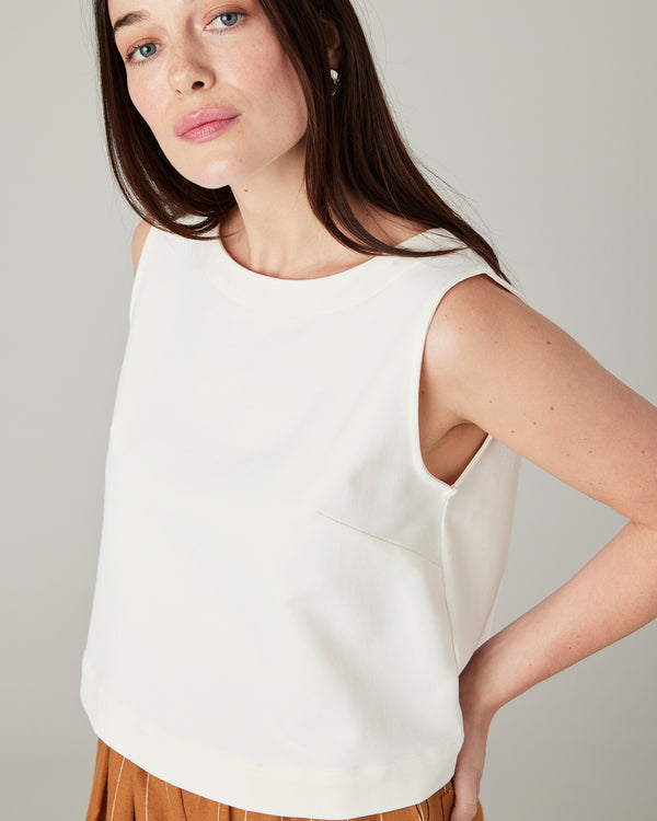 model wears esme jersey ecru top